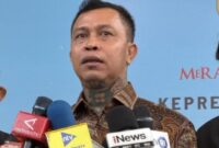 Pemimpin Besar Pasukan Merah Tariu Borneu Bangkule Rajakng (TBBR) Panglima Jilah di Istana Kepresidenan, Jakarta Pusat, Jumat (28/8). (CNN Indonesia)