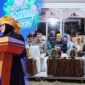 Wakil Bupati Tojo Una-Una, Hj. Surya Lapasiri, saat membacakan sambutan Bupati Ilham S. Lawidu pada penutupan Festival Budaya Bakulupi 2026 di Kelurahan Bailo Baru, Kecamatan Ampana Kota, Rabu malam (16/9/2026).
