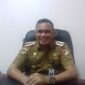 Kadis Sosial Tojo Una-Una, Darmawan Suaib