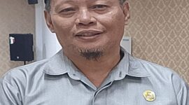 Ketua DPRD Touna Gusnar A
 Suleman, SE. MM