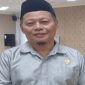 Ketua DPRD Touna Gusnar A
 Suleman, SE. MM