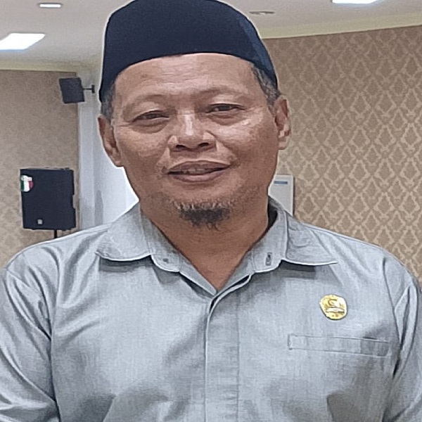 Ketua DPRD Touna Gusnar A
Suleman, SE. MM